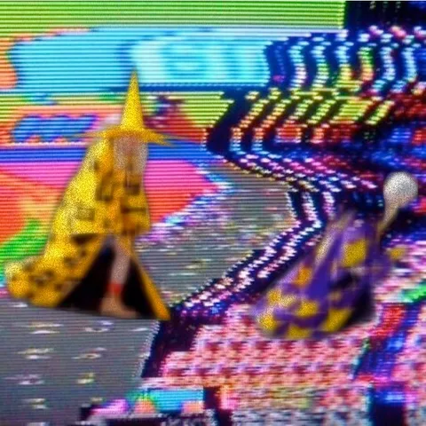 A colorful glitch collage of a wizard and a computer screen